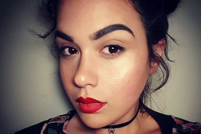 Amber takes a closeup selfie.